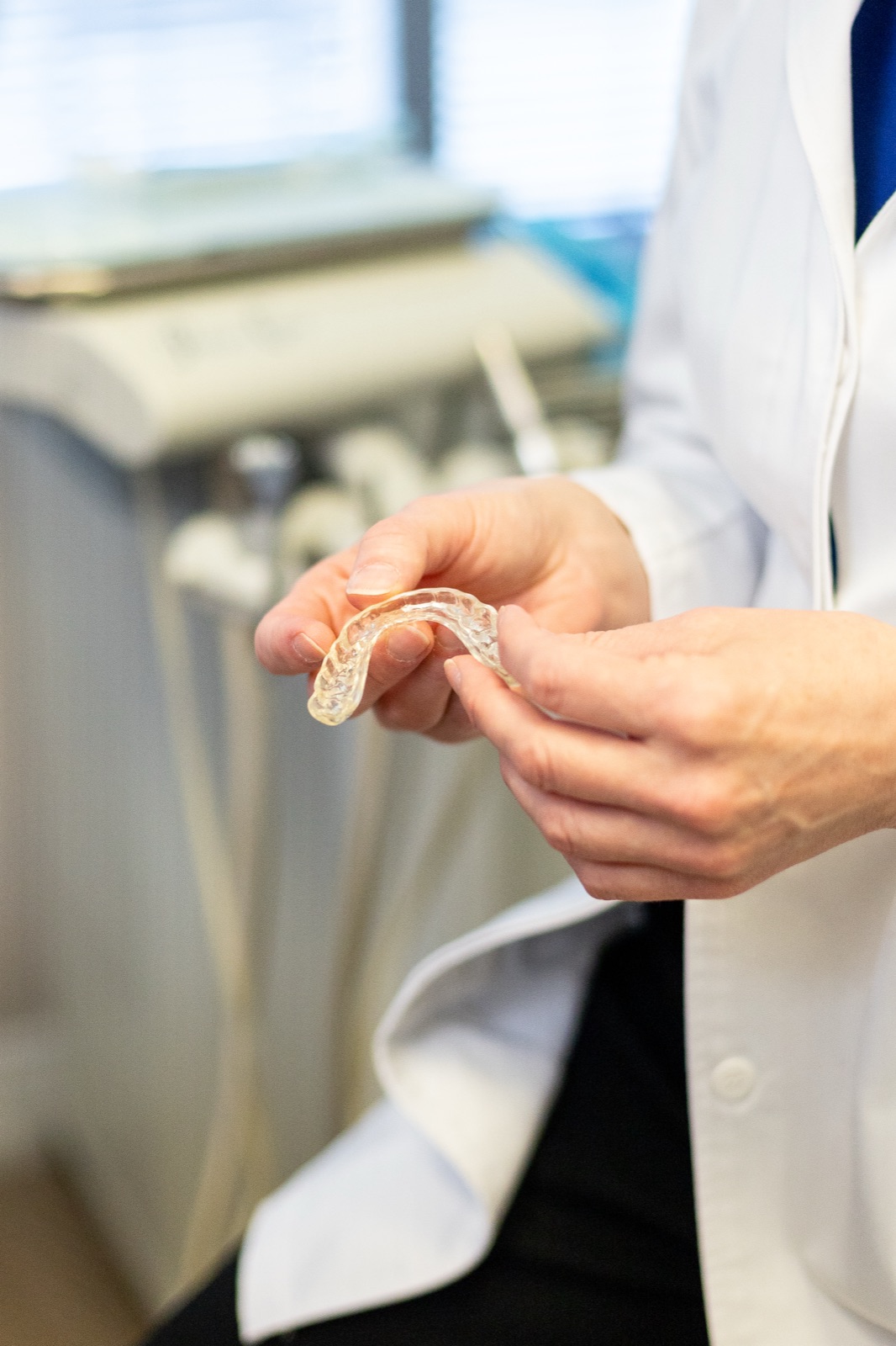 A custom oral appliance used to treat sleep apnea