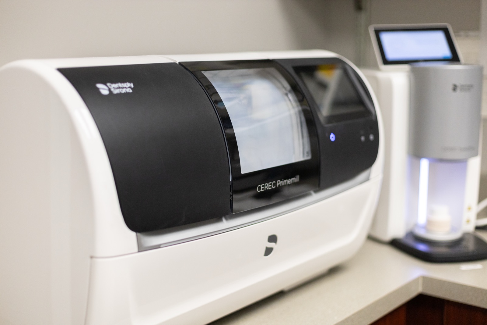 The in-office CEREC milling unit in operation